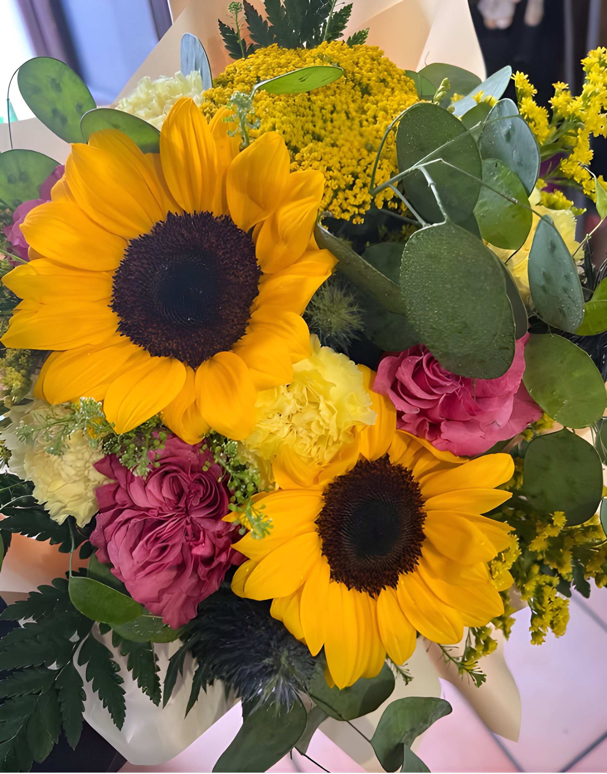 Composizione floreale con girasoli