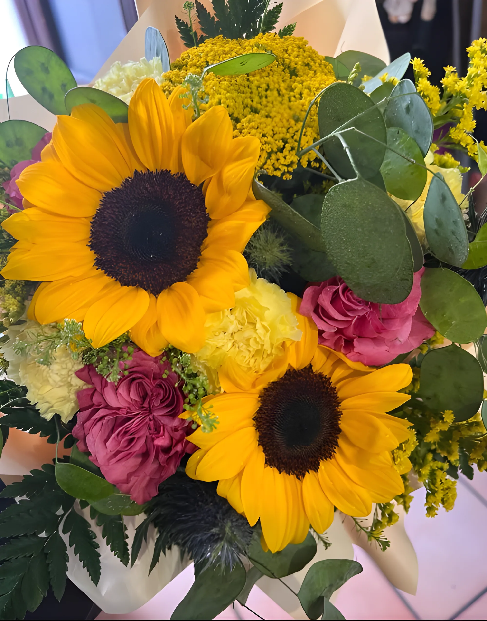 Composizione floreale con girasoli
